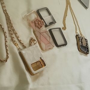 Set of 4 Z flip 3 phone cases 2 have chains on them one has a ring for holding